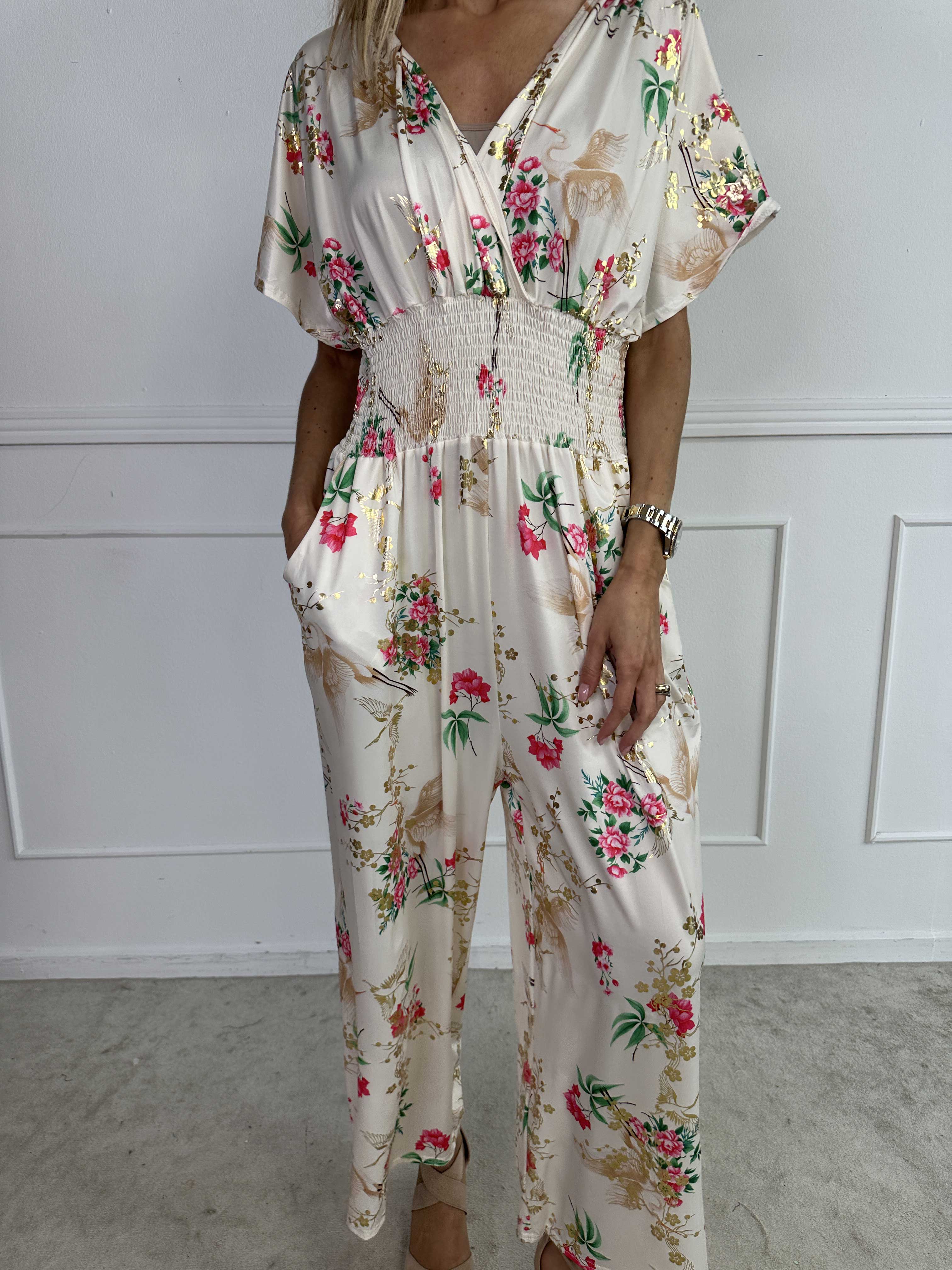 Pams Fly Jumpsuit - Elastisk buksedragt med blomster- og fugleprint